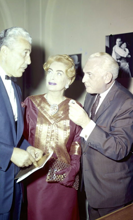 1961 candid with Cesar Romero.