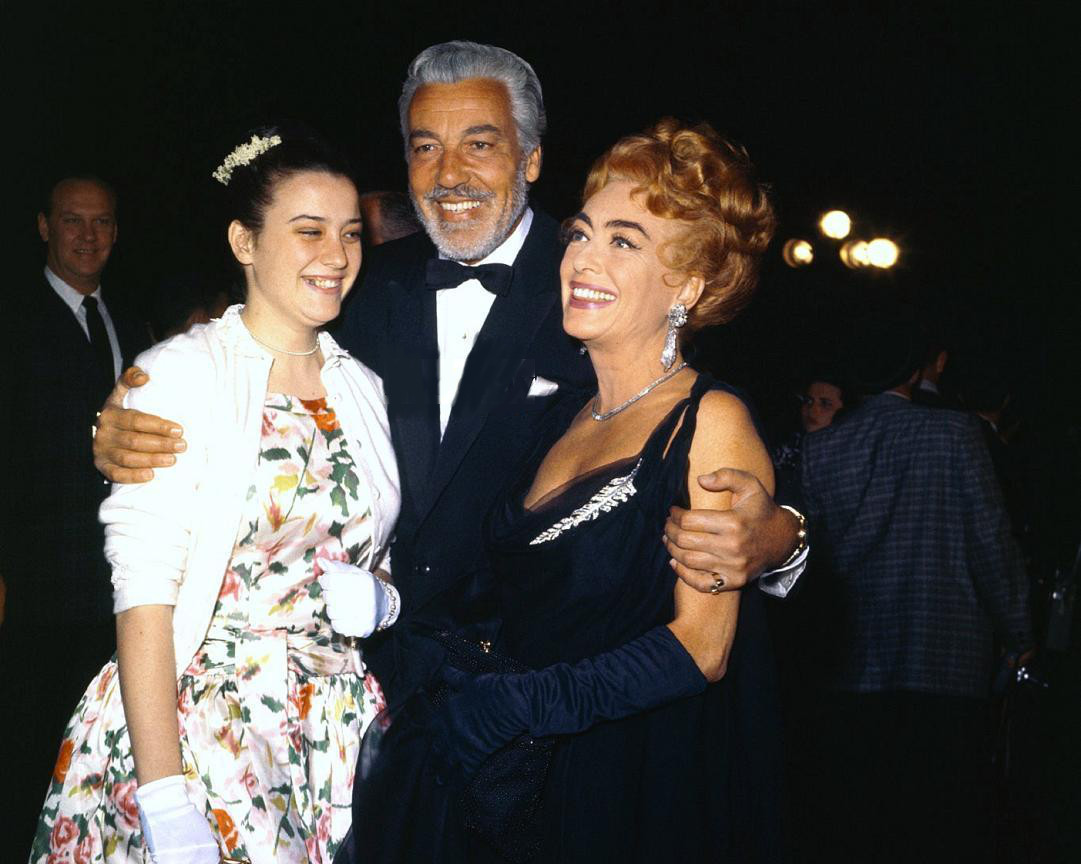 April 9, 1962, with Cesar Romero and daughter Cindy at the Academy Awards.