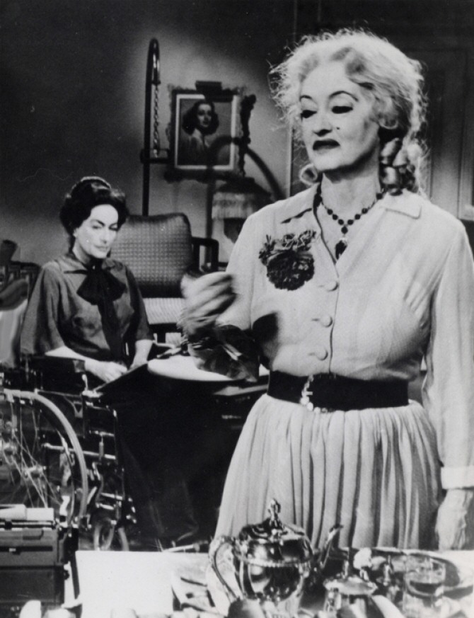 1962. On the set of 'Baby Jane' with Bette Davis.