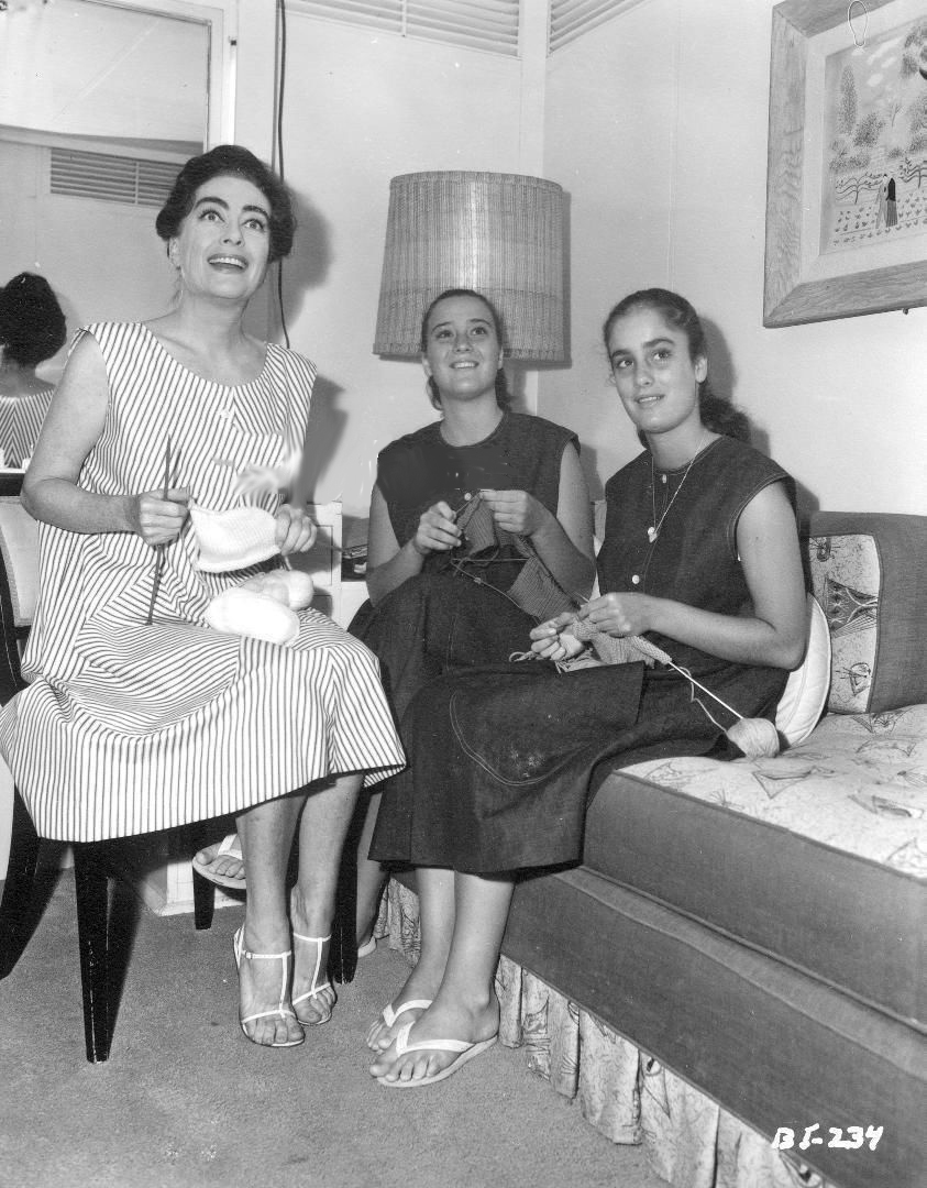 1962. On the set of 'Baby Jane' with twins Cathy and Cindy.