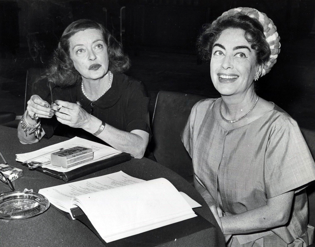 July 1962. On the set of 'Baby Jane' with Bette Davis.