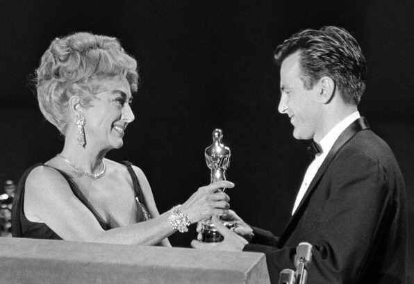 April 1962. Presenting Maximilian Schell with his Best Actor Oscar for 'Judgment at Nuremberg.'