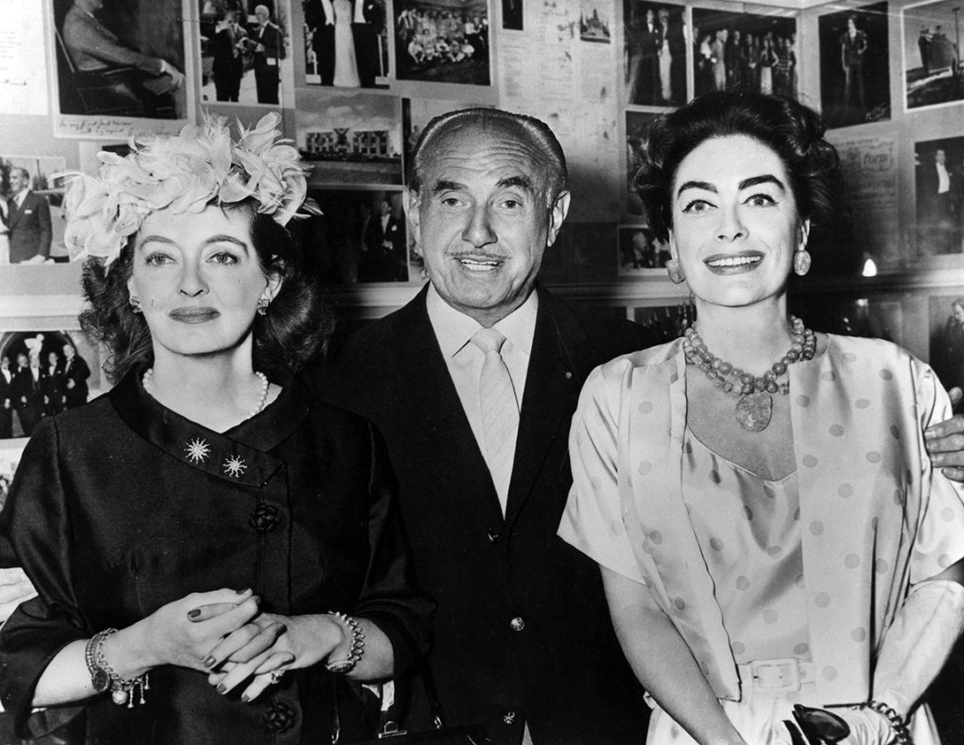 With Bette Davis and Jack Warner at the Trophy Club.