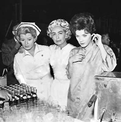 1963. On 'The Caretakers' set, with Constance Ford and Polly Bergen. (Thanks to Bryan Johnson.)