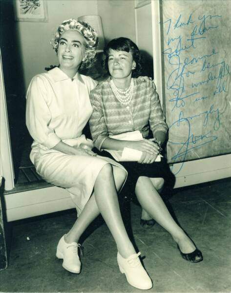 On the set of 'The Caretakers,' autographed to her assistant in the photo.