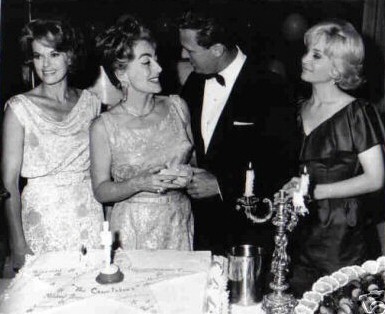 At the 1963 'Caretakers' wrap party. From left: Janis Paige, Joan, Robert Stack, Susan Oliver.