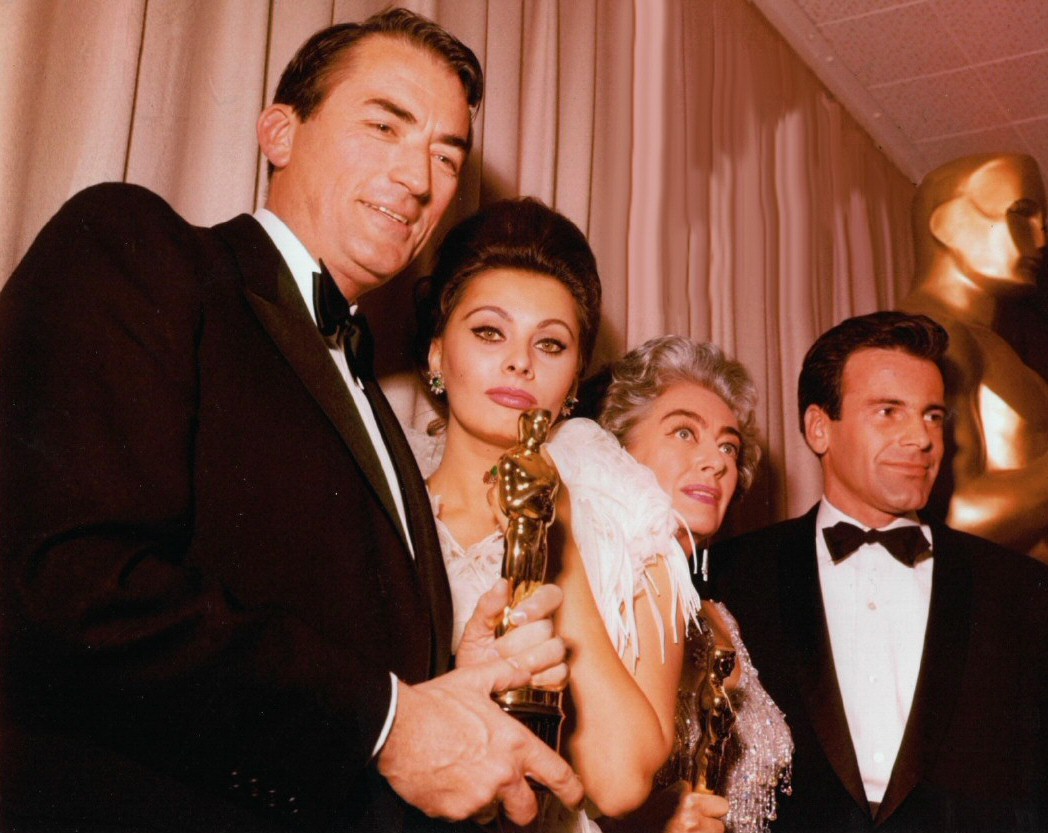 At the 4/8/63 Academy Awards with Gregory Peck, Sophia Loren, and Maximilian Schell.