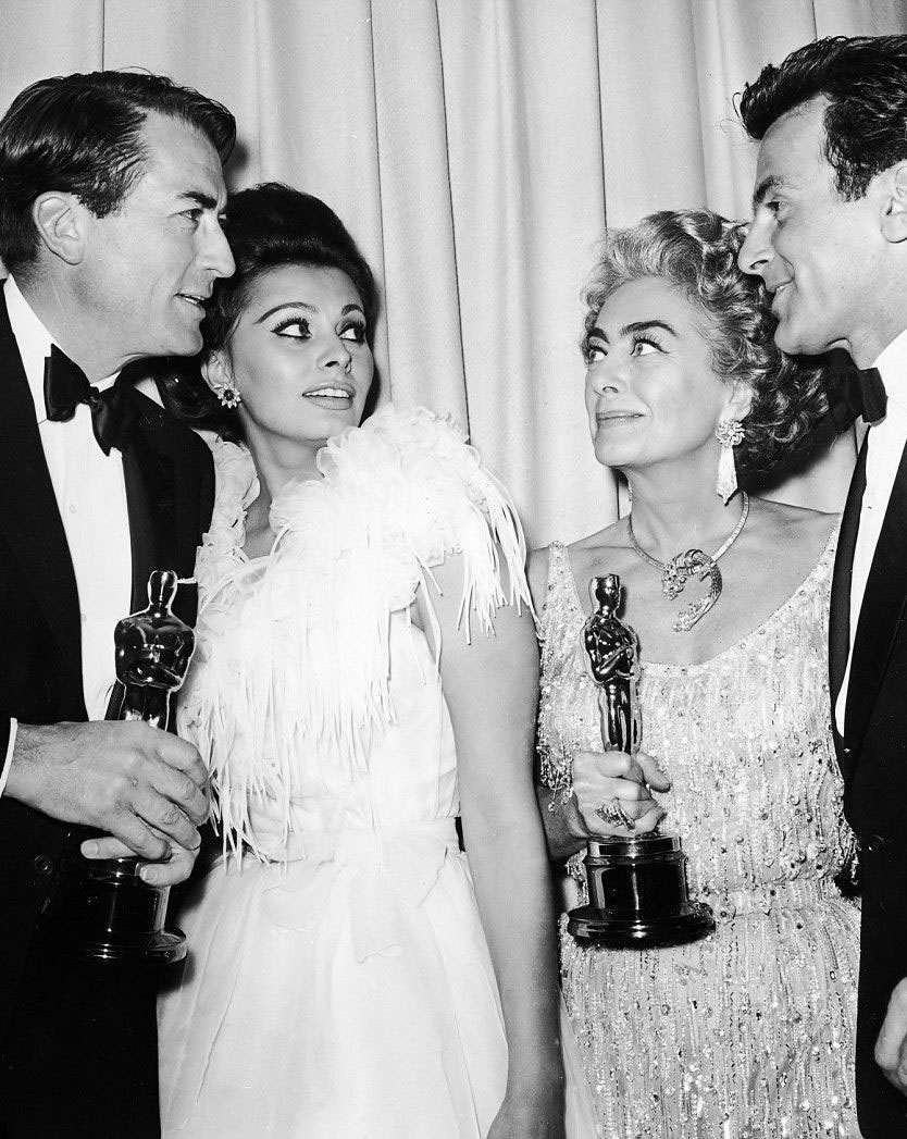 At the 4/8/63 Oscars with Gregory Peck, Sophia Loren, and Maximilian Schell.