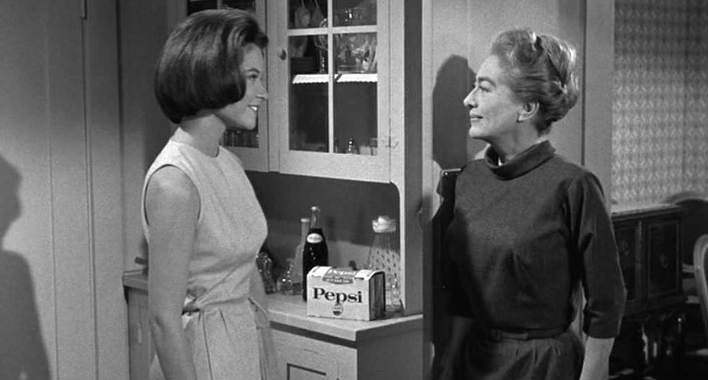 1964. 'Strait-Jacket' screen shot. With Diane Baker and Pepsi.