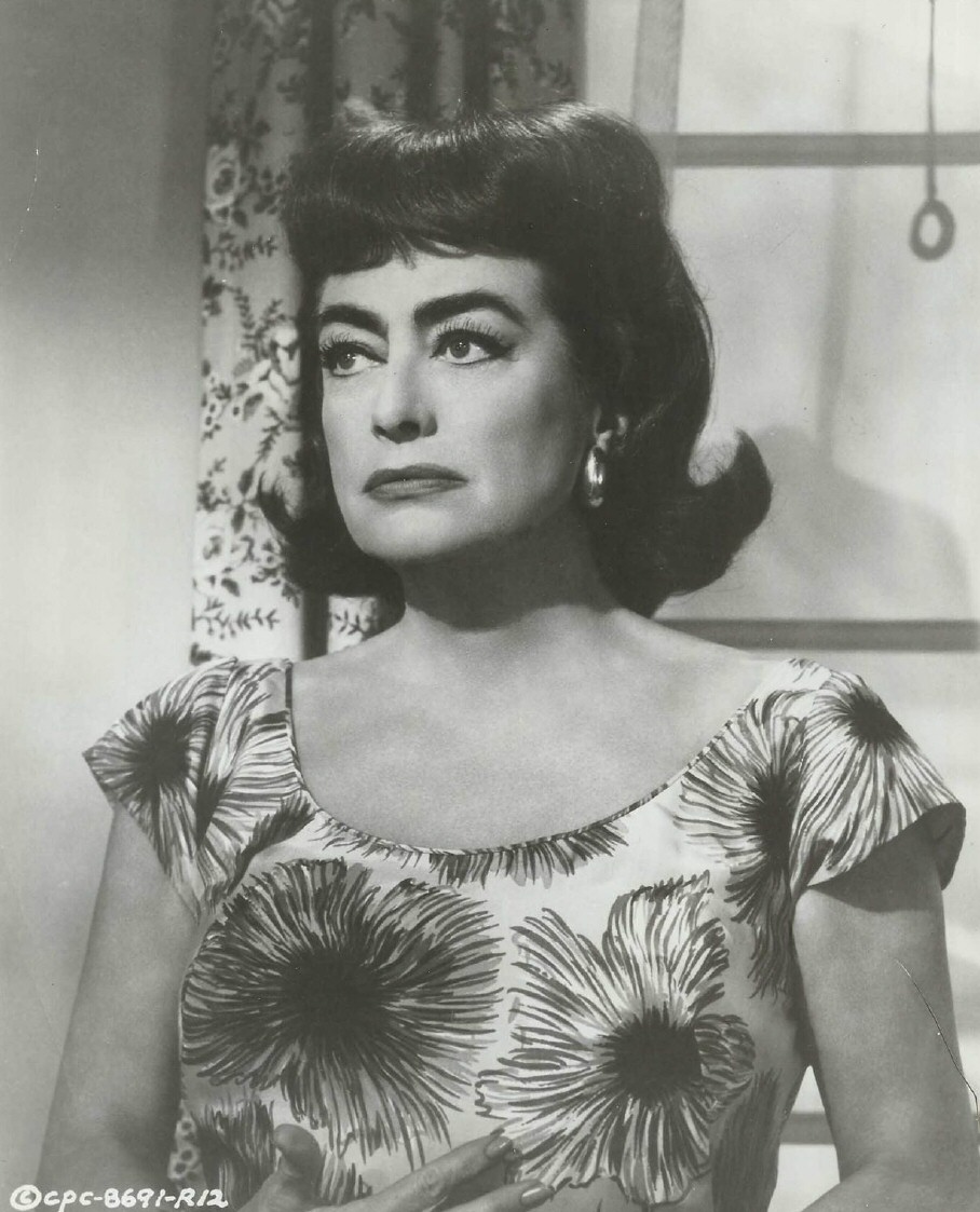 1964. A film still from 'Strait-Jacket.'
