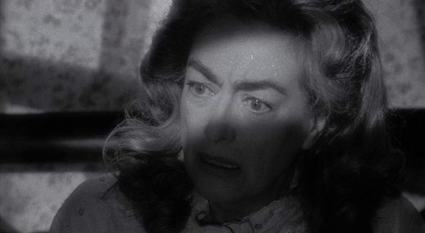 1964. Screen shot from 'Strait-Jacket.'