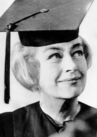 1966. Joan receives an honorary Associate of Arts degree in Newport, RI, from Vermont Jr. Court College. (Thanks to Bryan Johnson.)