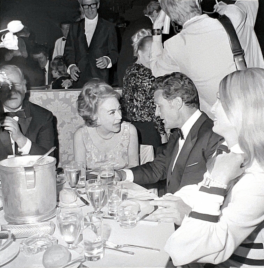 1969. With Robert Stack at the Governors Ball following the Academy Awards.