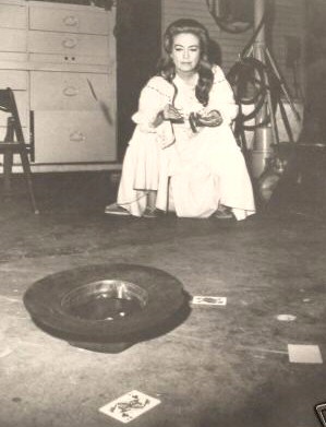 January 1970. Joan tossing cards on the set of 'The Virginian.'