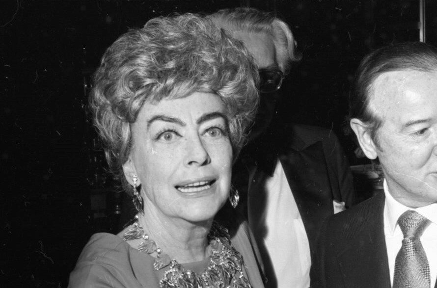 9/23/74. Joan's last public appearance, at NYC's Rainbow Room. (Earl Blackwell at right.)