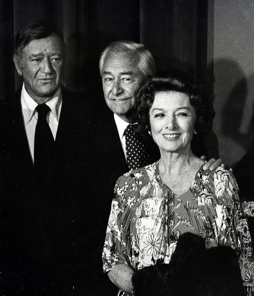 June 24, 1977, at the Samuel Goldwyn Theater tribute to Joan. John Wayne, Robert Young, Myrna Loy.