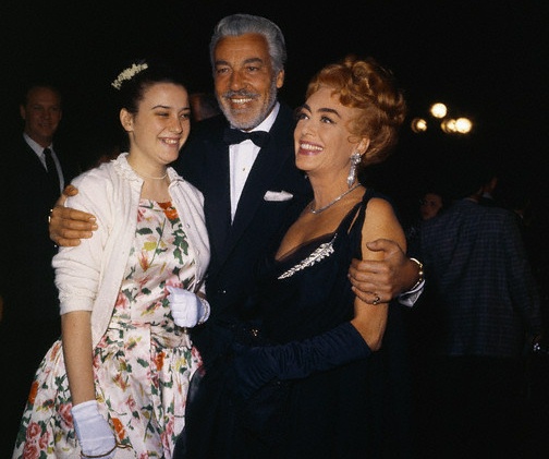 April 9, 1962. With daughter Cathy and Cesar Romero at the Oscars.