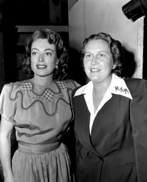 1947. On the set of 'Daisy Kenyon' with a fan-club member.