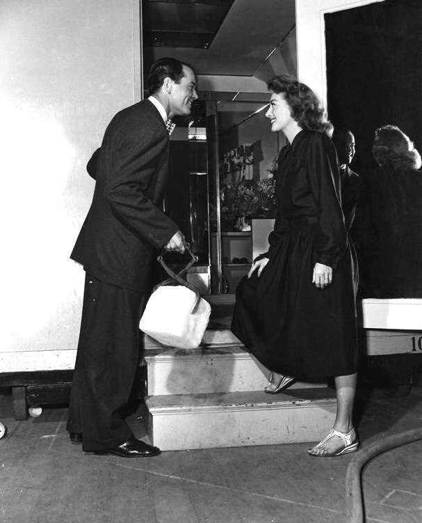 1947. On the set of 'Daisy Kenyon' with Henry Fonda.