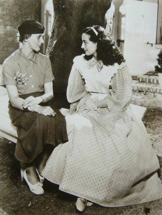 1936. On the set of 'Gorgeous Hussy' with Anna Boettiger, Roosevelt's daughter.