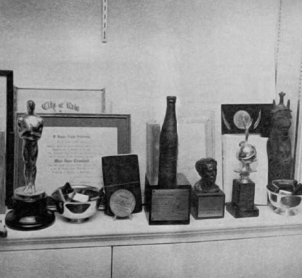 Imperial House, 22-G. Joan's awards, including her Oscar and her 'Pally.' (Thanks to Bryan Johnson.)