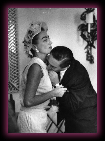 Joan at the Dorchester Hotel with unknown companion, 1956.
