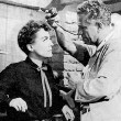 With director Nicholas Ray on the 'Johnny Guitar' set.