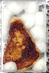 This is the toast that sold on eBay in Nov. '04 for $28,000. The woman's face in the toast was alleged to be the Virgin Mary's. However, in Feb. '05, the LA Times Online made a claim that the face was, indeed, Joan Crawford's!