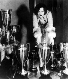 A 1925 publicity shot, with trophies won from dance contests at local Hollywood clubs.