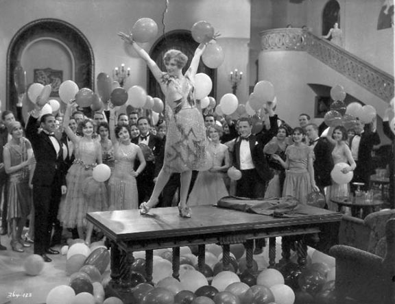 1928, 'Our Dancing Daughters.' The famous table-top dance.