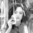 1928. With makeup shield on the set of 'Rose-Marie.'