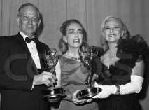 Joan with Melvyn Douglas and Ginger Rogers. Source: CORBIS