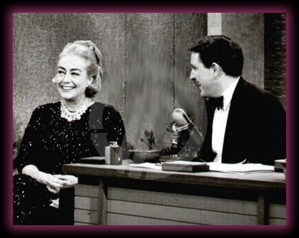 Joan with Merv Griffin, 1965.