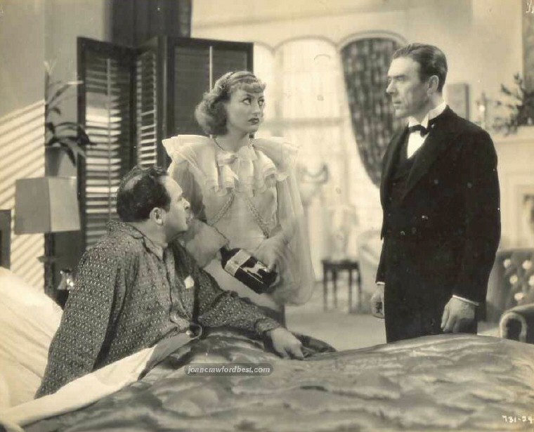 1934. 'Sadie McKee.' With Edward Arnold, left.
