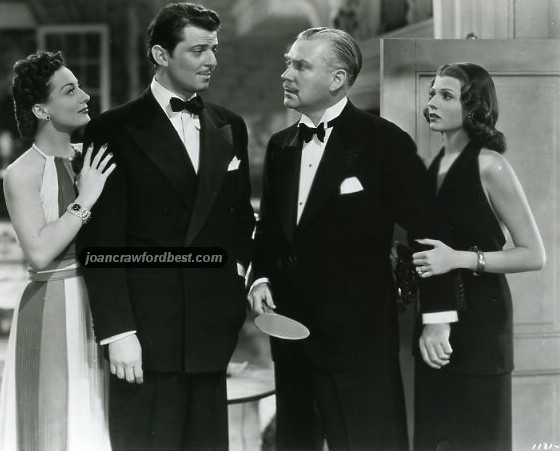 With Rita Hayworth and unknown men.