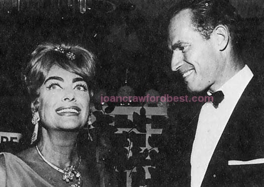 July 1962. With Charleton Heston at the International Press Honors Awards show.