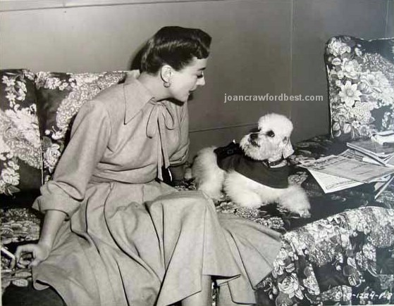 1950. On the set of 'Harriet Craig.'