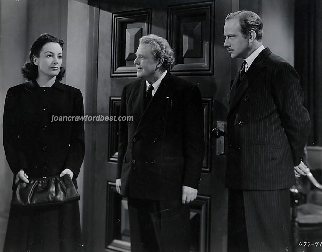 With unknown and Melvyn Douglas.