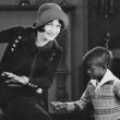 1925. Doing the Charleston on the set of 'Sally, Irene and Mary' with young dancer Jimmy.