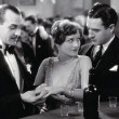 1928. 'Four Walls.' With Louis Natheau and John Gilbert (right).