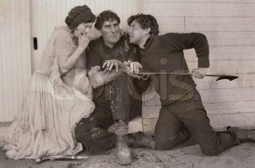 Joan with Ernest Torrence (left) and Ramon Novarro.