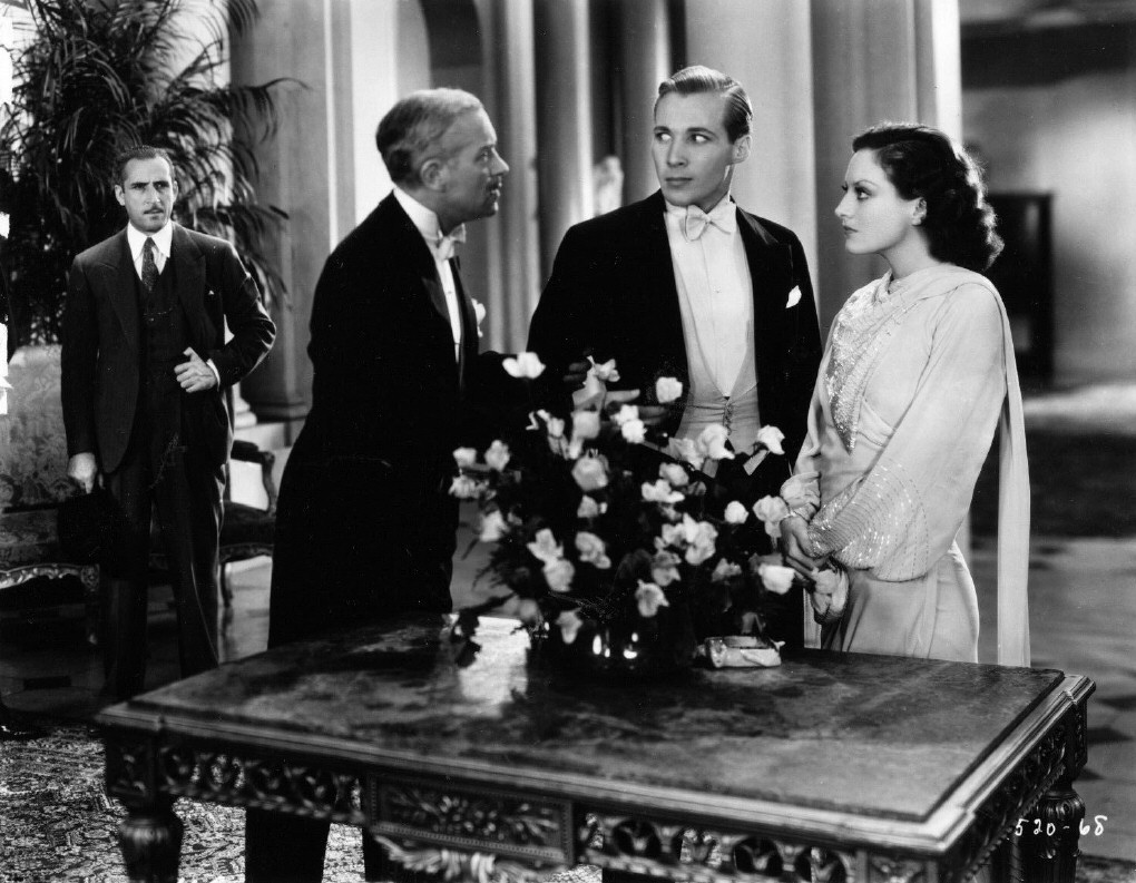 1930. 'Paid.' With Kent Douglass, right.