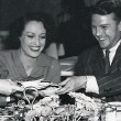 Circa 1938 with Sydney Guilaroff seated right of Joan) at the MGM commissary.