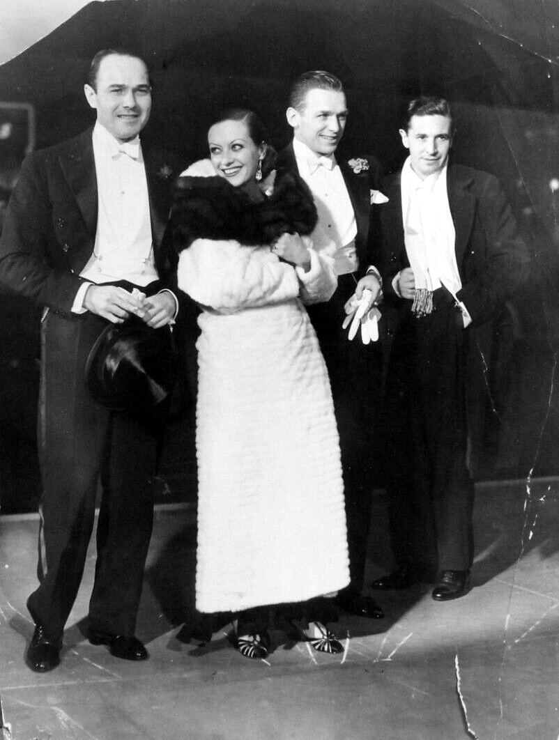 1931 at Hollywood premiere with William Haines, husband Doug Jr, and Ivor Novello.