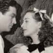 With Robert Taylor.