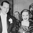 1936. With husband Franchot Tone at unknown event.