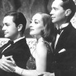 1937. 'The Bride Wore Red.' With Robert Young, left, and Franchot Tone.