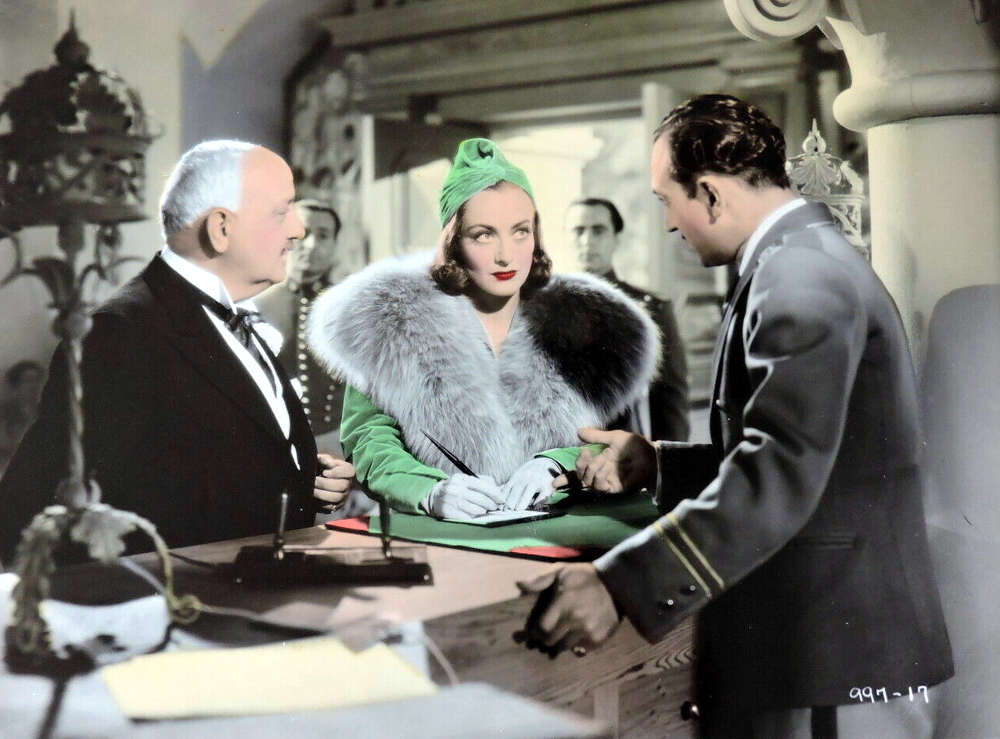 1937. 'The Bride Wore Red.' Studio-colorized version of above photo.