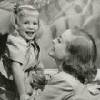 1937 with niece Joanie LeSueur. Shot by Hurrell. 