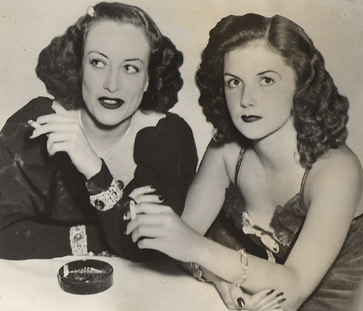 April 1939. With socialite Brenda Frazier.